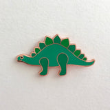 green stegasaurus dinosaur pin badge