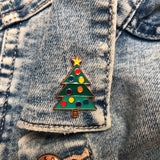 xmas brooch, christmas brooch, xmas badge on denim jacket, christmas tree enamel pin, christmas badge, christmas jumper badge, christmas accessory, stylish christmas accessory, tasteful christmas accessory, christmas pin